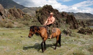 Vladimir Putin riding a horse