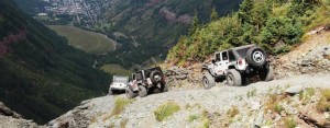 131_1203_08+the_3rd_annual_jk_experience+jeeps_driving_down_black_bear_pass