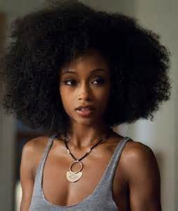She is beautiful to me.  It is not because she is black.  I love her hair, love her eyes and her complexion.  