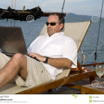 man-deck-yacht-laptop-6447088