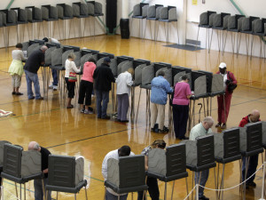 Voters cast their ballots at the Herbert Young Community Center polling place in Cary, N.C.. on Thursday, Oct. 18, 2012, the first day of early voting in North Carolina. (AP Photo/The News & Observer, Shawn Rocco)