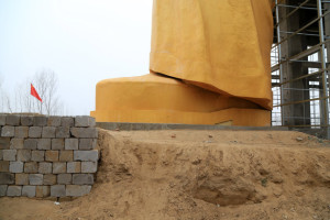 TONGXU, CHINA - JANUARY 04: (CHINA OUT) A huge statue of Chairman Mao Zedong, 36.6 meters in height, is under construction at Zhushigang village on January 4, 2016 in Tongxu County, China. The statue costs nearly 3 million yuan (459,300 USD) donated by several entrepreneurs and some villagers in Zhushigang village. (Photo by ChinaFotoPress/ChinaFotoPress via Getty Images)