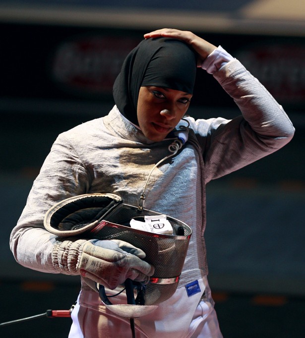 Ibtihaj Muhammad of U.S. prepares to compete during her women's sabre team event against Tunisia at the World Fencing Championships in Catania October 15, 2011. REUTERS/Tony Gentile (ITALY - Tags: SPORT FENCING) - RTXXS7S