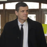 Washington state Auditor Troy Kelley arrives for a federal court hearing, Tuesday, Dec. 1, 2015, in Tacoma, Wash. Kelley was asking a judge to force the Justice Department to return $908,000 that was seized from Kelley after he was charged criminally with possession of more than $1 million in stolen money as well as money laundering. (AP Photo/Ted S. Warren) WATW104