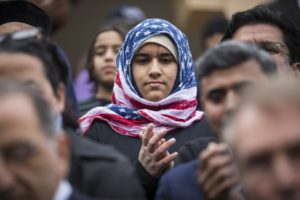 STERLING, VA - DECEMBER 11:  Hidayah Martinez Jaka, a young Venture Scout, wearing an American flag hijab is seen as U.S. Democratic presidential candidate Martin O'Malley speaks following a noon service at the ADAMS Center Mosque December 11, 2015 in Sterling, Virginia. O'Malley is the first 2016 presidential candidate to a visit a mosque in the wake of last week's shooting in San Bernardino and condemned anti-Muslim rhetoric by Republican presidential candidate Donald Trump during his remarks. (Photo by Samuel Corum/Anadolu Agency/Getty Images)