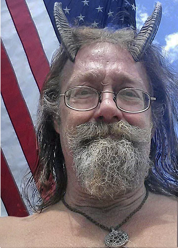 Phelan MoonSong has been wearing the genuine goat horns since 2008 and claims to feel naked without them. As they are such an important part of his paganism, he wore his “Horns of Pan” to the Bureau of Motor Vehicles (BMV) in Bangor, Maine to pose for his new driver’s license photo.