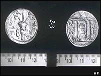 Either side of the Petra Drachma coin